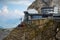 Large red funicular cabin taking tourists up the mountain in the Swiss Alps