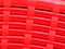 Large red plastic farm and garden use basket with imitate woven mesh