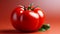 A large red tomato with green leaves