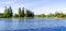 Large redwood trees on the shoreline of Lake Ellis, Marysville, Yuba County, California