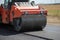 Large road-roller paving a road