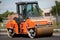 Large road-roller paving a road