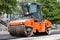 Large road-roller paving a road