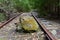 Large rock blocking railroad tracks from a land slide