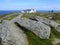 Large rock boulders and house