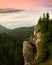 Large rock illuminated at sunset sunrise with the Carpathian mo