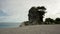 A large rock resembling a human head on Kolbano beach