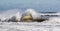 Large rolling waves crashing on the coast of Long Island