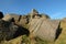 large rugged gritstone outcrop at the bridestones a large rock formation in west yorkshire near todmordenwith blue sky and