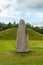 Large rune stone standing at an ancient burial ground