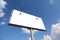 Large rusty billboard with two lanterns