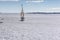 A large sailing frigate, barque or brig sails on a calm sea