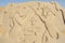 Large sand sculpture of egyptian hieroglyphic carvings