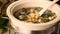 Large saucepan Chinese soup with shrimp atmosphere