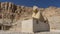 A large sculpture of the sphinx in front of the temple of Pharaoh- Queen Hatshepsut