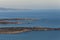 A large sea view of Corsica coast, blue mediterranean sea.