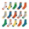 A large set of colored socks with various patterns and ornaments. children`s socks in a cartoon style