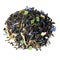 A large sheet of green tea, cornflower petals, sunflower petals, colorful candied fruit close-up.
