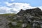 Large shelter cairn on Hindscarth looking up to summit shelter cairn