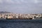 A large ship passes close to the houses on the Asian side of Istanbul, Turkey