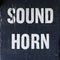 Large sign Sound Horn sign pained on exterior wall