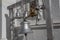 Large silver temple bells at the temple of Goddess Ganga in Gangotri, India.