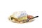 Large slice of coconut cream pie on floral luncheon plate with fork resting on plate