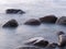 Large smooth boulders on the shore