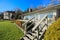 Large spacious deck of grey waterfront home