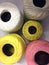 Large Spools of Thread in White, Yellow, Brown and Pink