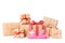 Large Stack of Gift box wrapped in recycled paper with ribbon bow, hearts and christmas ornament