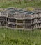 A large stack of lobster traps