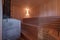 Large standard design classic wooden russian bath sauna interior with hot stones