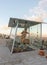 Large statue of the Child of God in a glass showcase on the roof of a building on Manger street in Bethlehem in the Palestinian