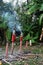 Large Sticks of Incense Burn at A Buddhist Temple in Thailand