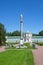 A Large stone greenhouse and a column with a statue of Minerva in the Kuskovo Estate, Moscow, Russia