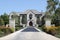 Large stone home with pillars