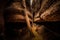 Large stones that resemble snake scales. This is Naka Cave, Bueng Kan Province.