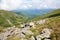 Large stones on summer mountainside