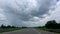 Large storm gathering above the road