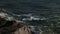 Large storm sea waves breaking on the rocks