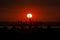 Large sun setting over Port Botany, Australia