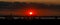 Large sun setting over Port Botany, Australia