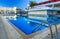 Large swimming pool with bar at a luxury tropical hotel resort