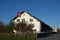 Large Swiss Farmhouse with Flag