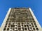 Large tall building unfinished concrete panel and monolithic frame new buildings against the blue sky at a construction site