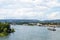 A large tanker ship sailing in Germany on the Rhine River. Transportation of oil, gas and gasoline, visible loading port, heavy se