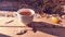 Large teacup with organic green tea on natural wood surface a fresh and cozy fall morning outside in warm sunshine