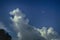 Large thick clouds against blue sky