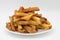 Large Thick Cut French Fries on a White Plate with a White Background